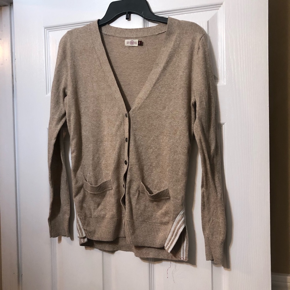 Heathered tan button up sweater with white stripes. Size M